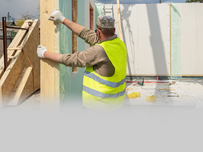 Man building modular buildings