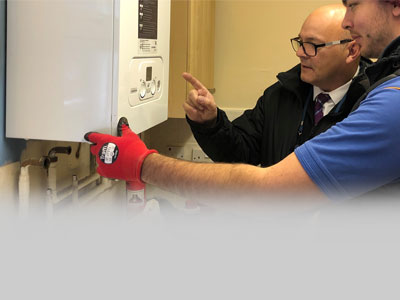 Midland Heart staff providing heating in social housing