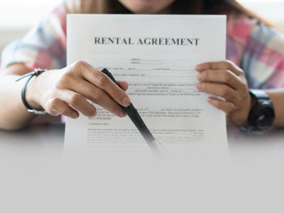 A landlord with a tenant's agreement during the Covid 19 outbreak