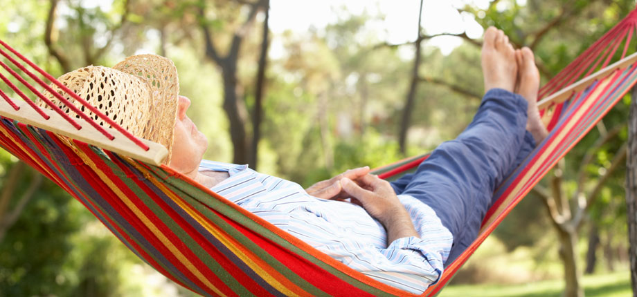 Man lazing in a hammock