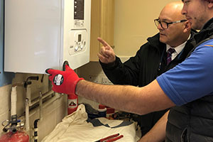 Midland Heart staff providing heating in social housing