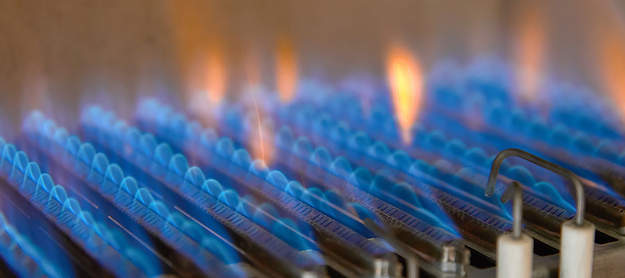 gas boilers - flames coming from a heat exchanger